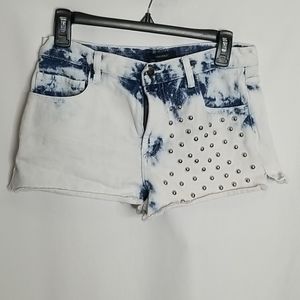 High waisted acid washed studded jean shorts.
